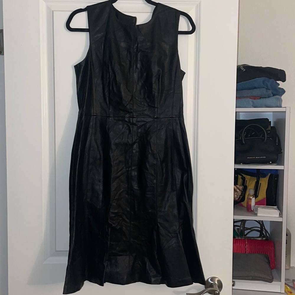 Calvin Klein size 8 black leather knee length dress